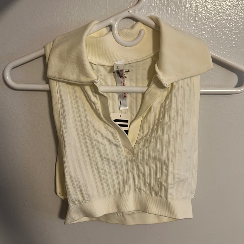 Very cute, more off white, cropped top with collar! New with tags!